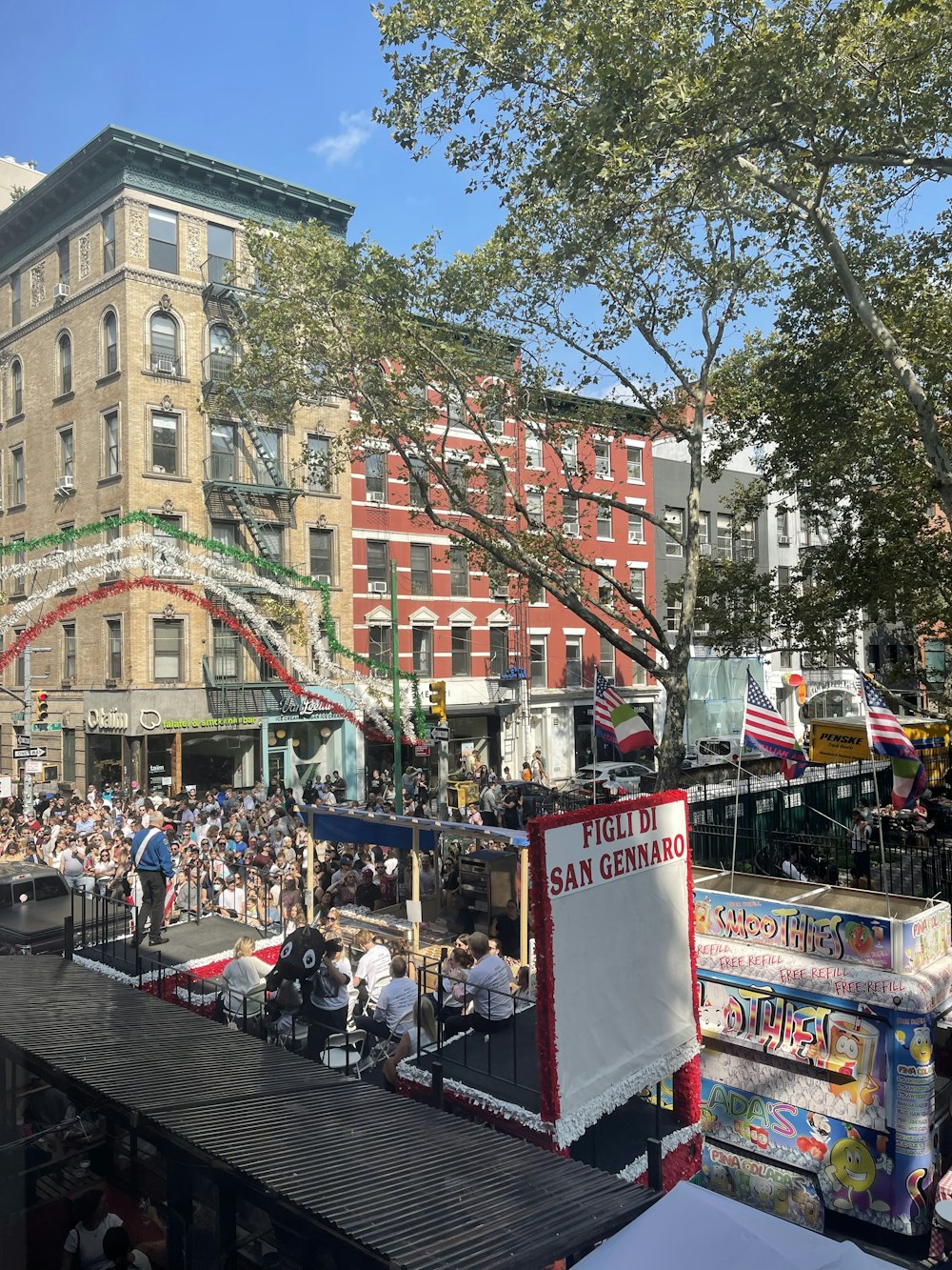 a crowd of people standing on top of a stage