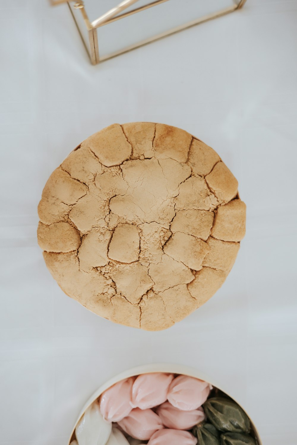 two bowls of food on a white table