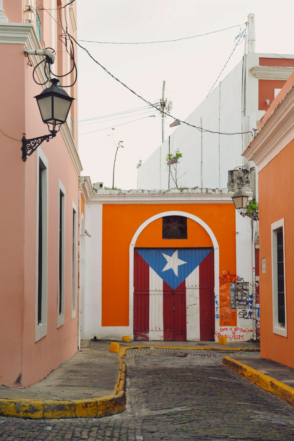 a red, white and blue door in a building