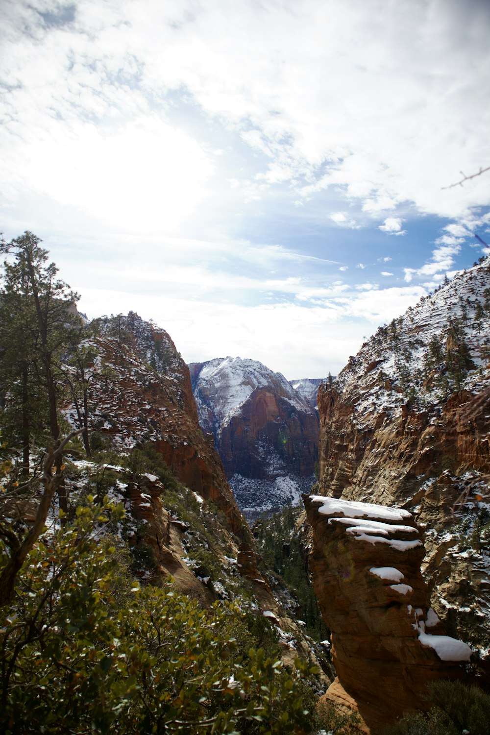 a view of the mountains from the top of a mountain