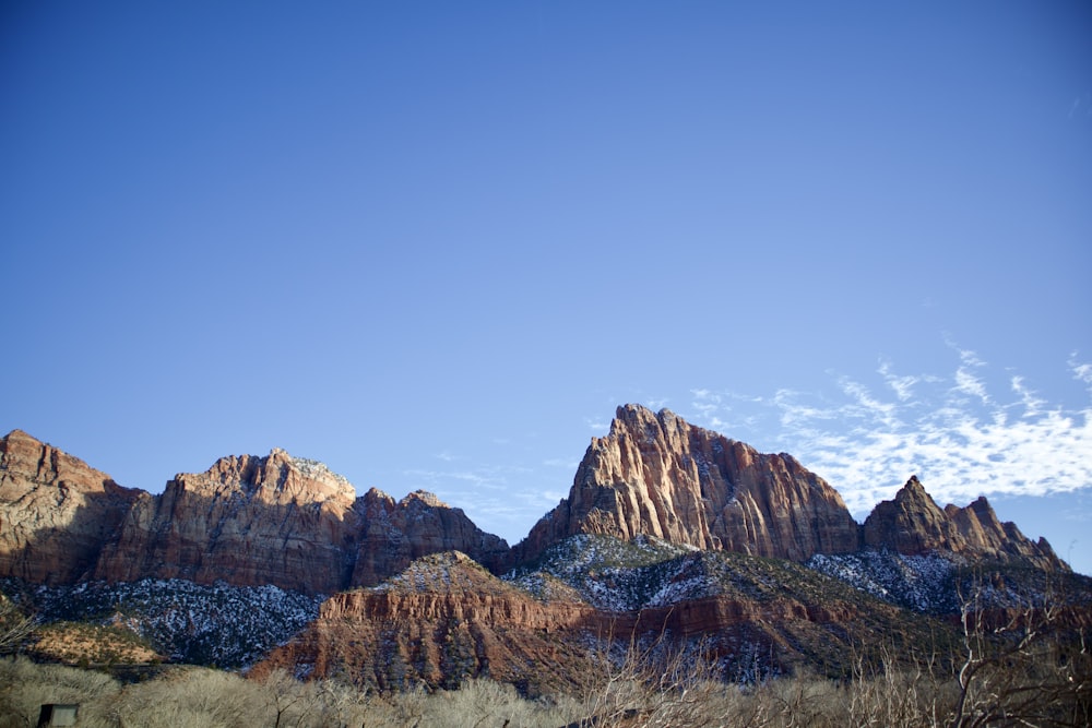 a mountain range with snow on the tops