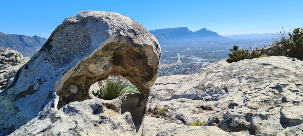 a large rock with a hole in the middle of it