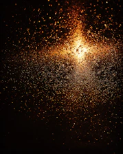 a street light that is shining on a dark background