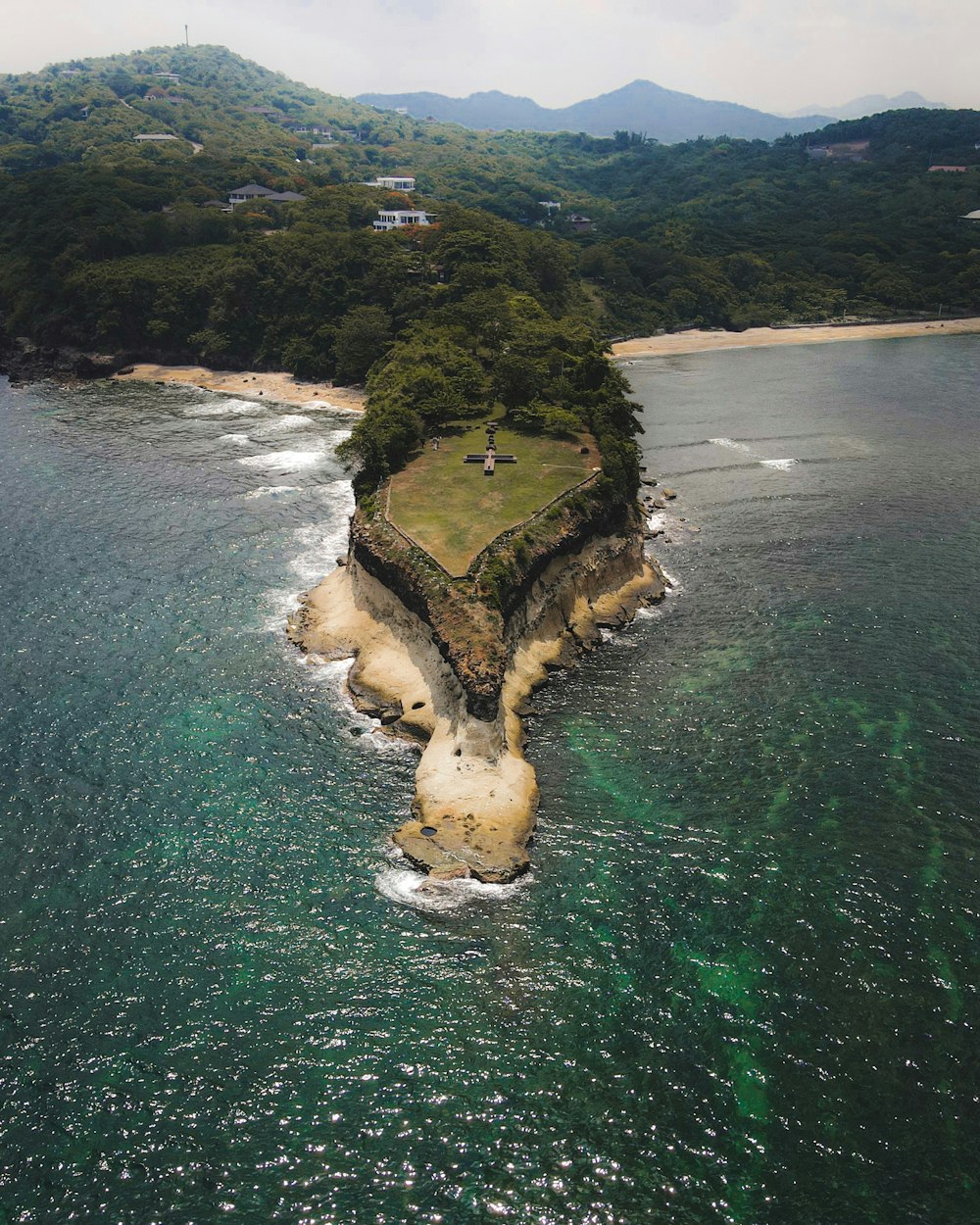 an island in the middle of a body of water