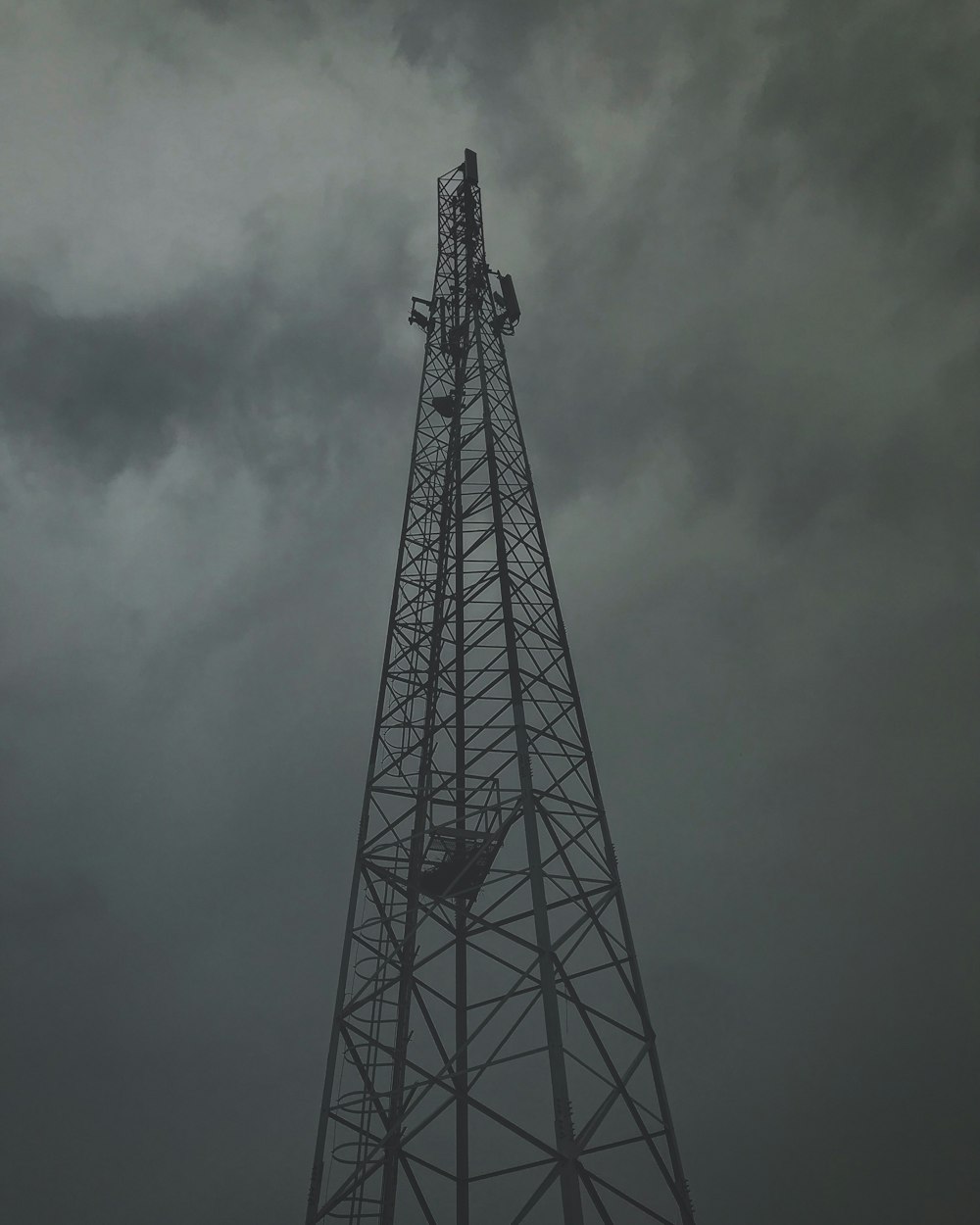 a tall tower with a sky in the background