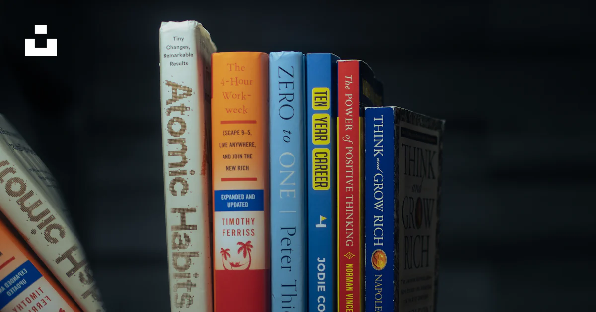 Pcm Book Image Stack A laptop computer sitting next to a stack of books photo – Free Book ...