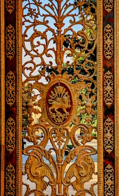 An elegant wrought iron gate standing open, showcasing the quality of our installation.