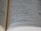 A close-up view of an open Bible, showing text in black print on white pages with a focus on the section discussing 'The remnant of Israel.' The text is clear and legible, with some portions bolded for emphasis.