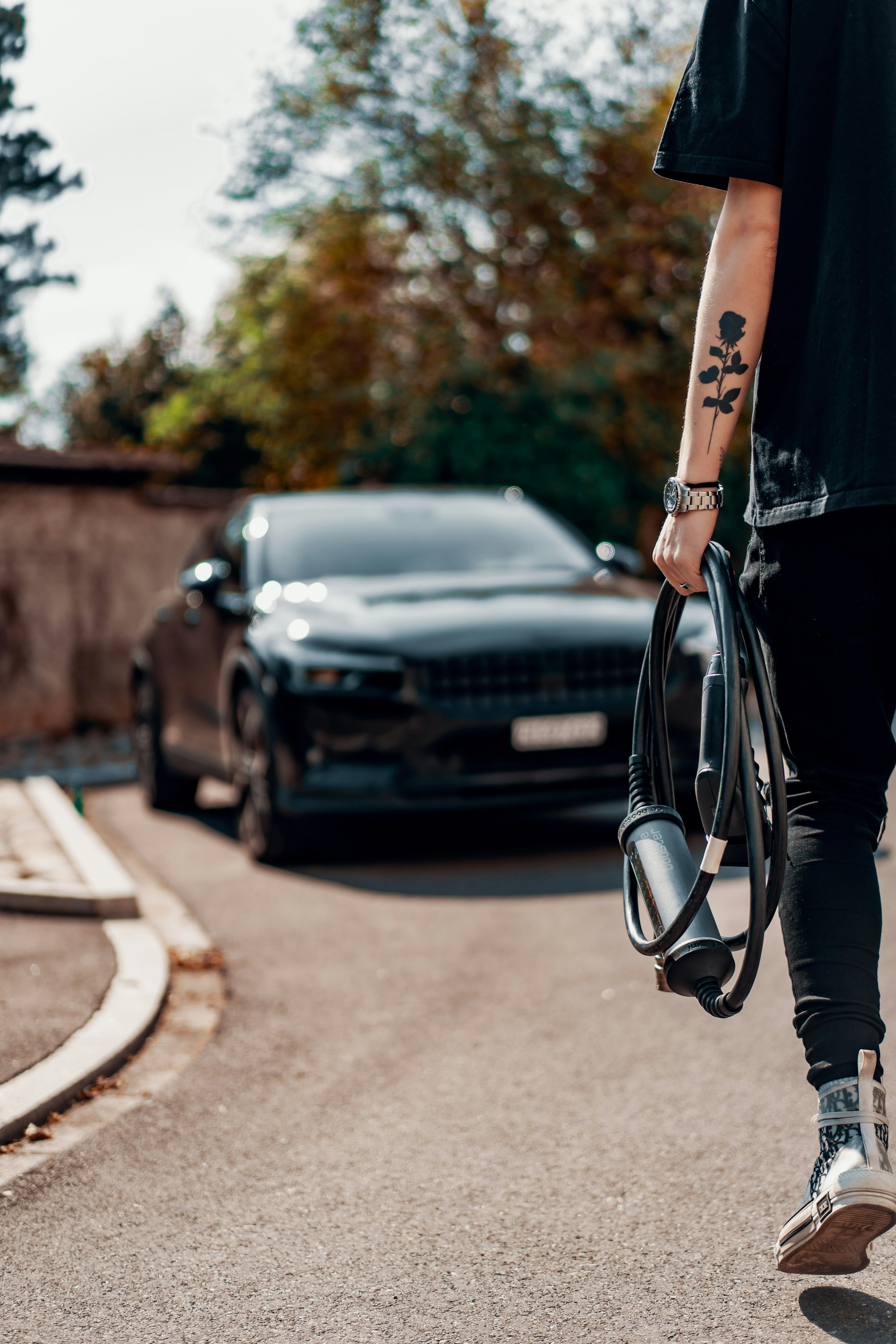 a person walking down a street with a bag