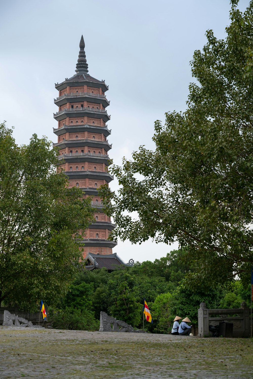 a tall building with a tower in the background