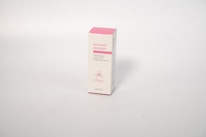 A rectangular white product box with pink accents. The box is labeled 'Recovery Intensive' and suggests purposes such as reducing irritation and strengthening skin protection.