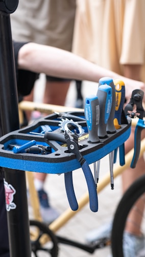 a bunch of tools that are on a rack