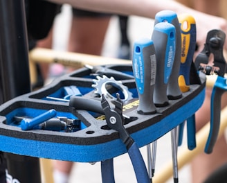 a bunch of tools that are on a rack