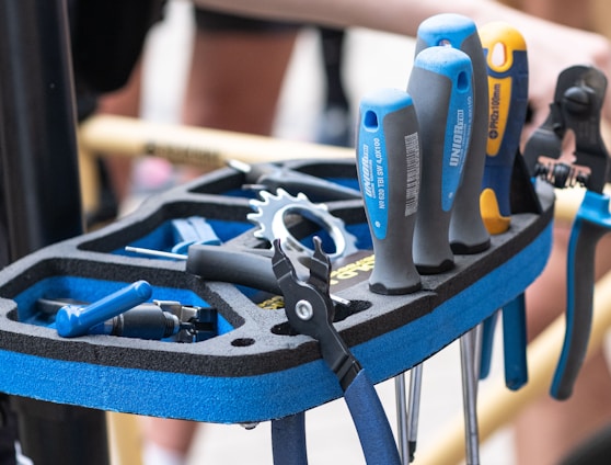 a bunch of tools that are on a rack