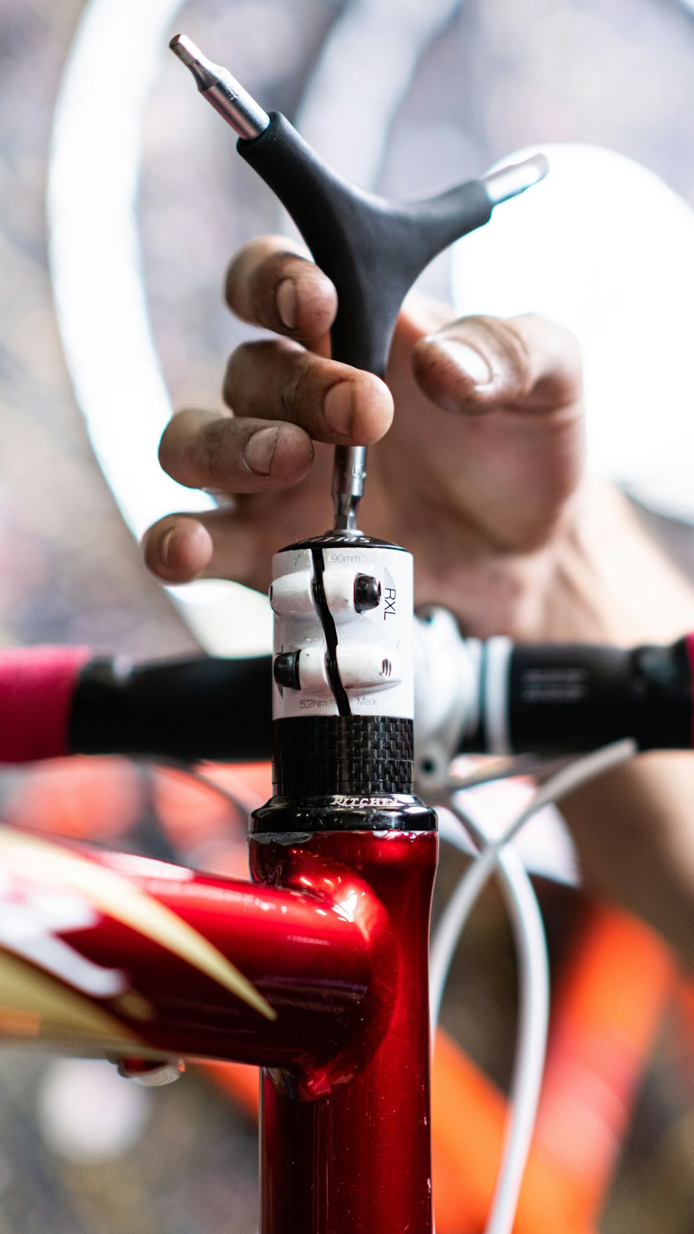 a close up of a person holding a bike handle