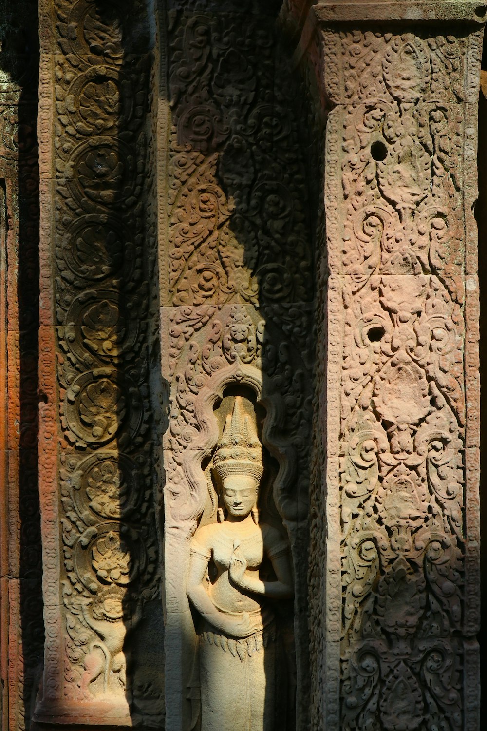 a statue of a woman holding a baby