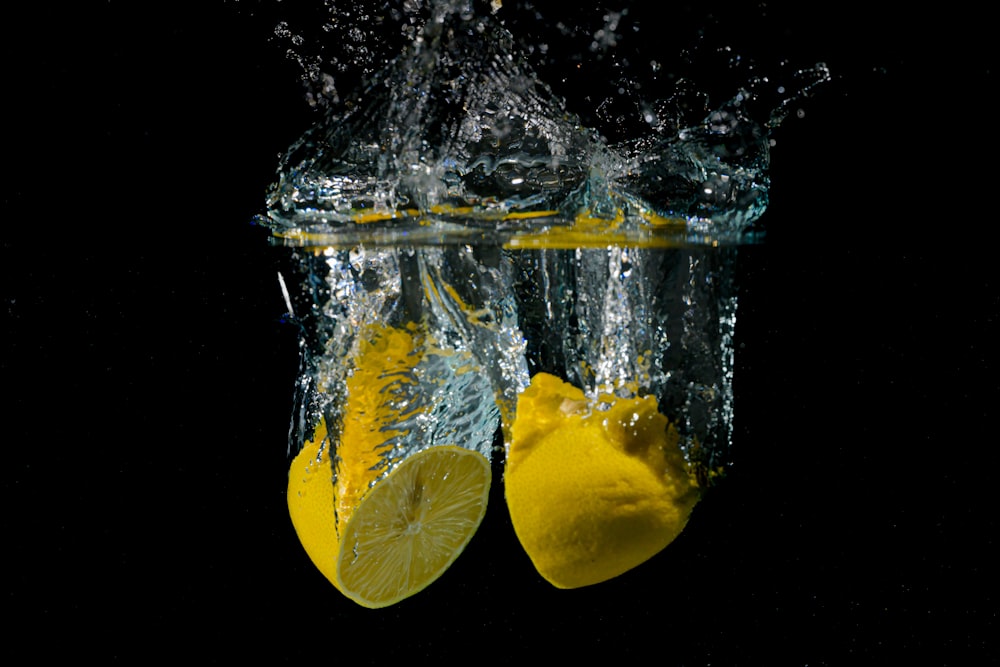 a couple of lemons that are under water