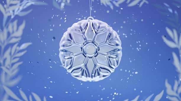 A close-up of bright, intricately designed 3D snowflake decorations hanging against a softly lit background.