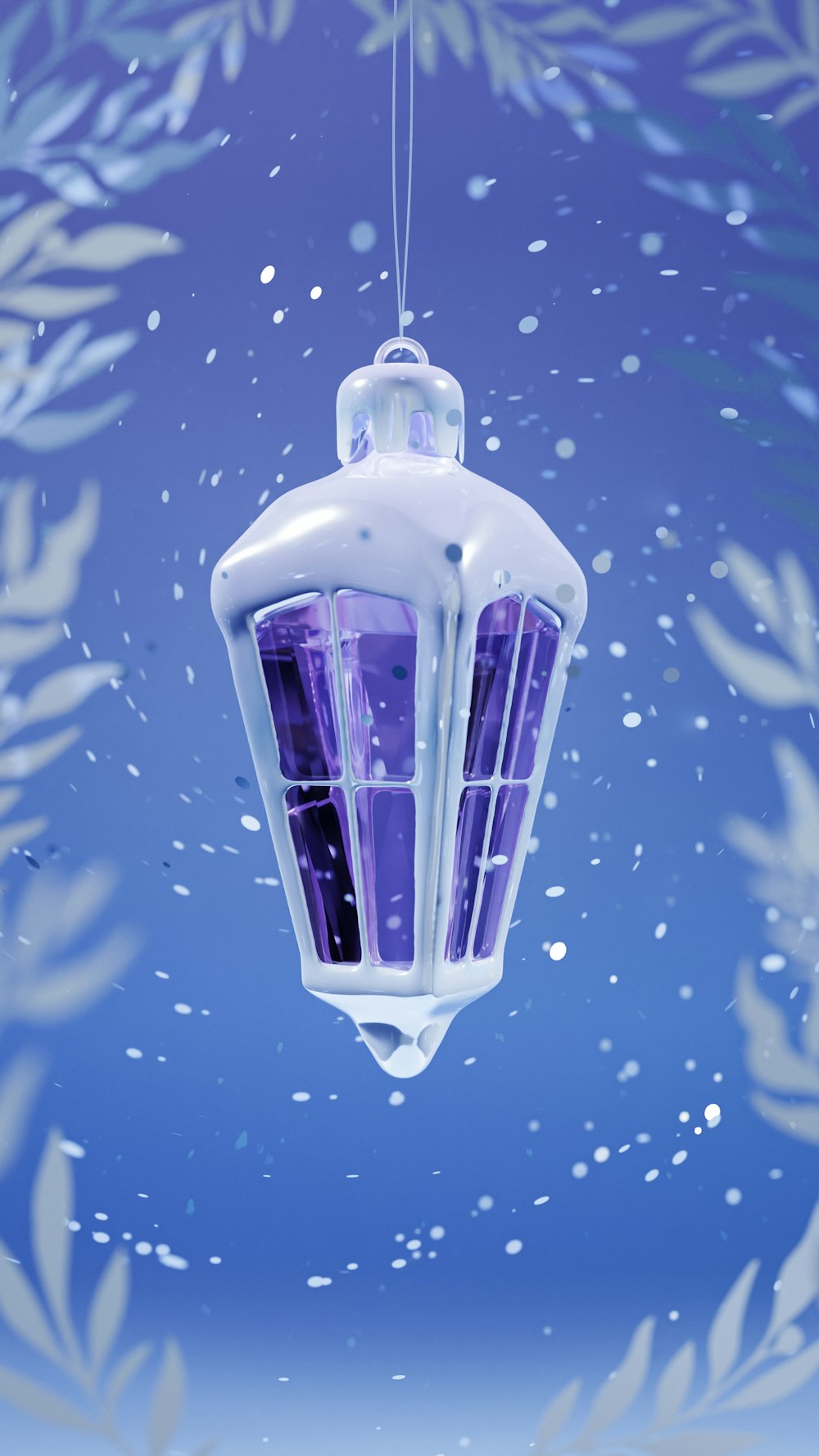 a lantern hanging from a string in the snow