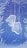 Two frosted white baby socks are hanging vertically, suspended against a background of soft blue with falling snowflakes. Surrounded by a border of blurred leaves, creating a wintery scene.