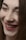 a close up of a person with a smile on their face