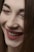 a close up of a person with a smile on their face