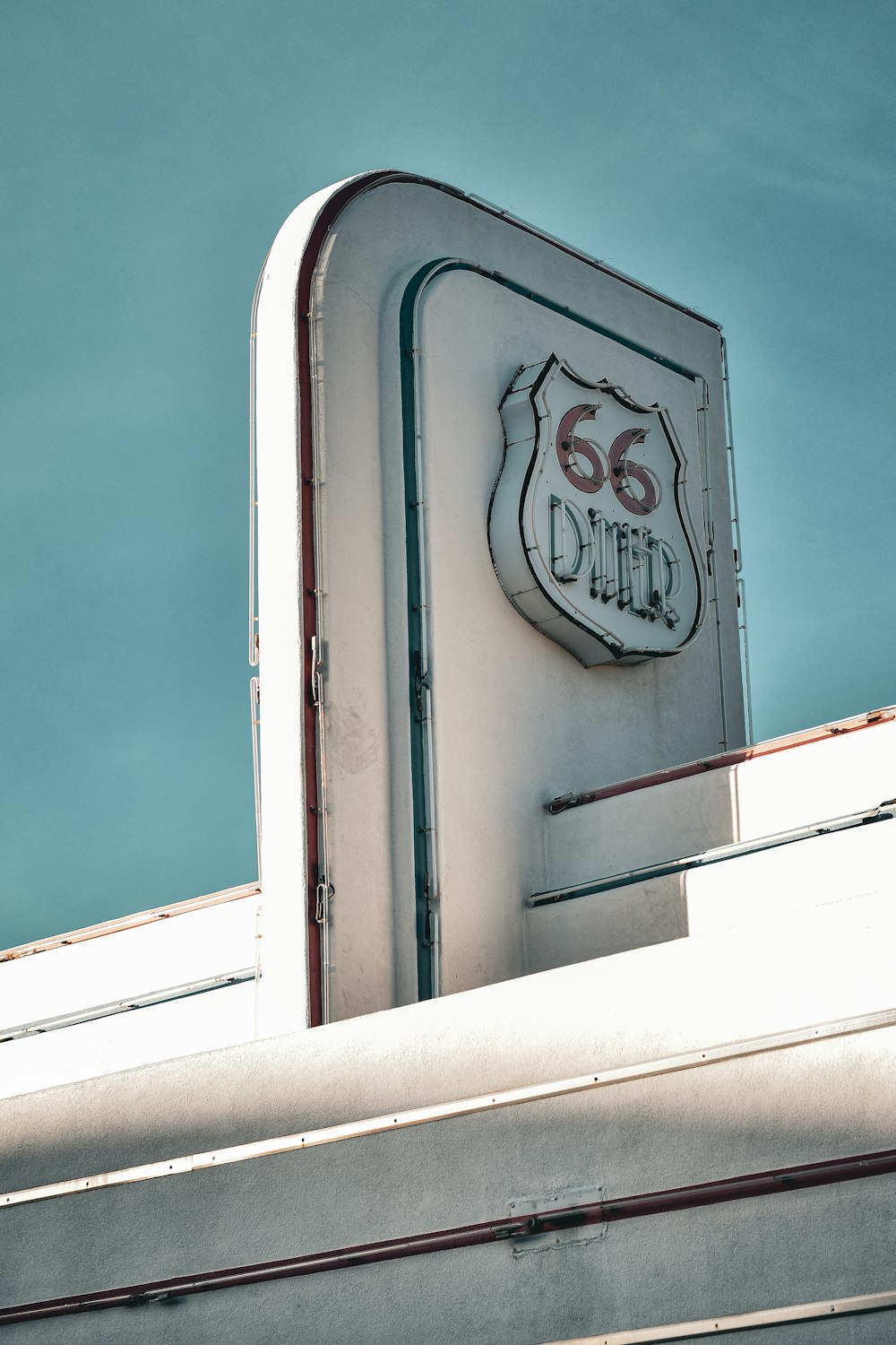 a close up of a sign on top of a building