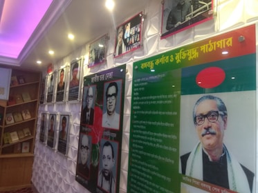 Wall display showing key articles from the Indian Constitution in Hindi and English.