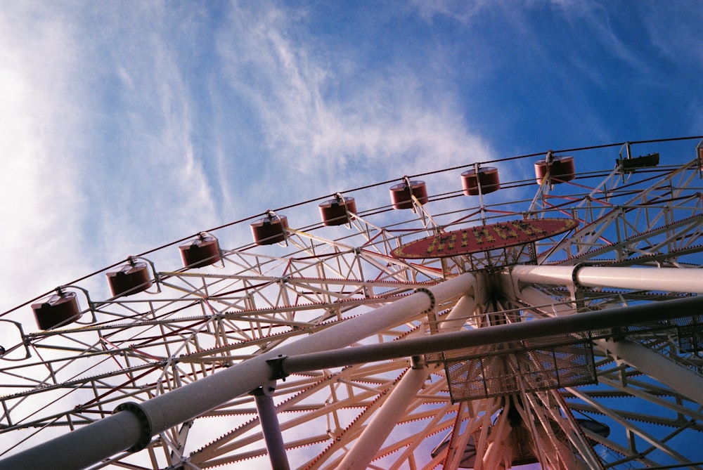 a ferris wheel with a blue sky in the background