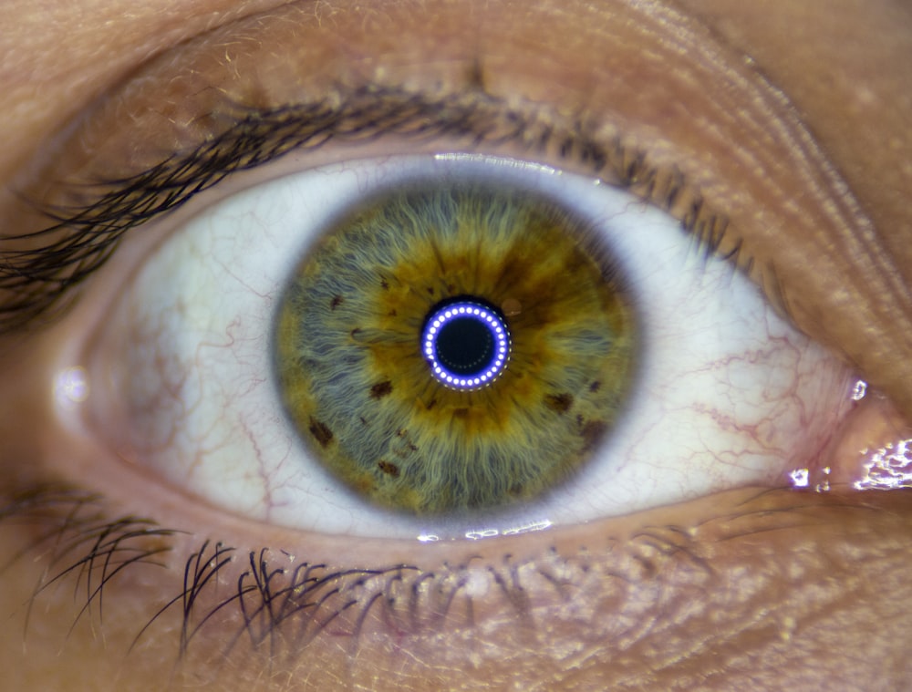 a close up of a person's eye with an iris