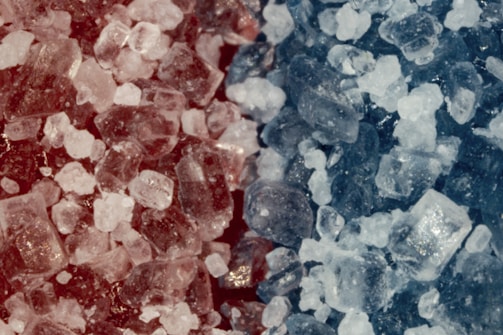 A close-up of colorful peptide crystal formations on a lab bench.