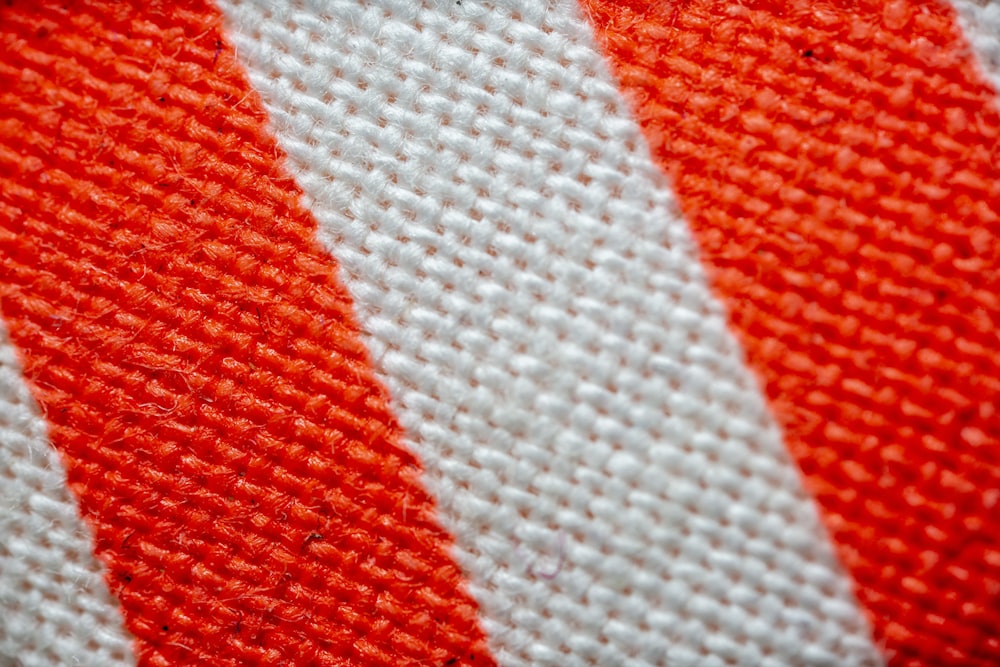 a close up of a red and white striped fabric