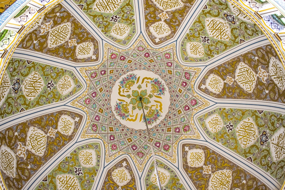 a close up view of a decorative ceiling