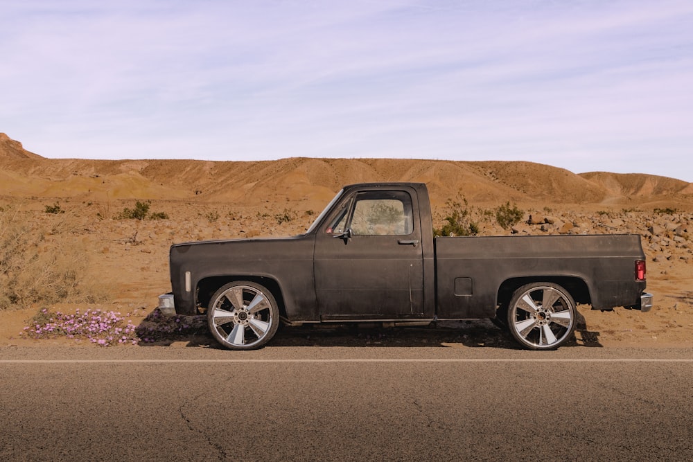 a truck parked on the side of the road