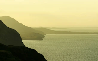 a large body of water surrounded by mountains