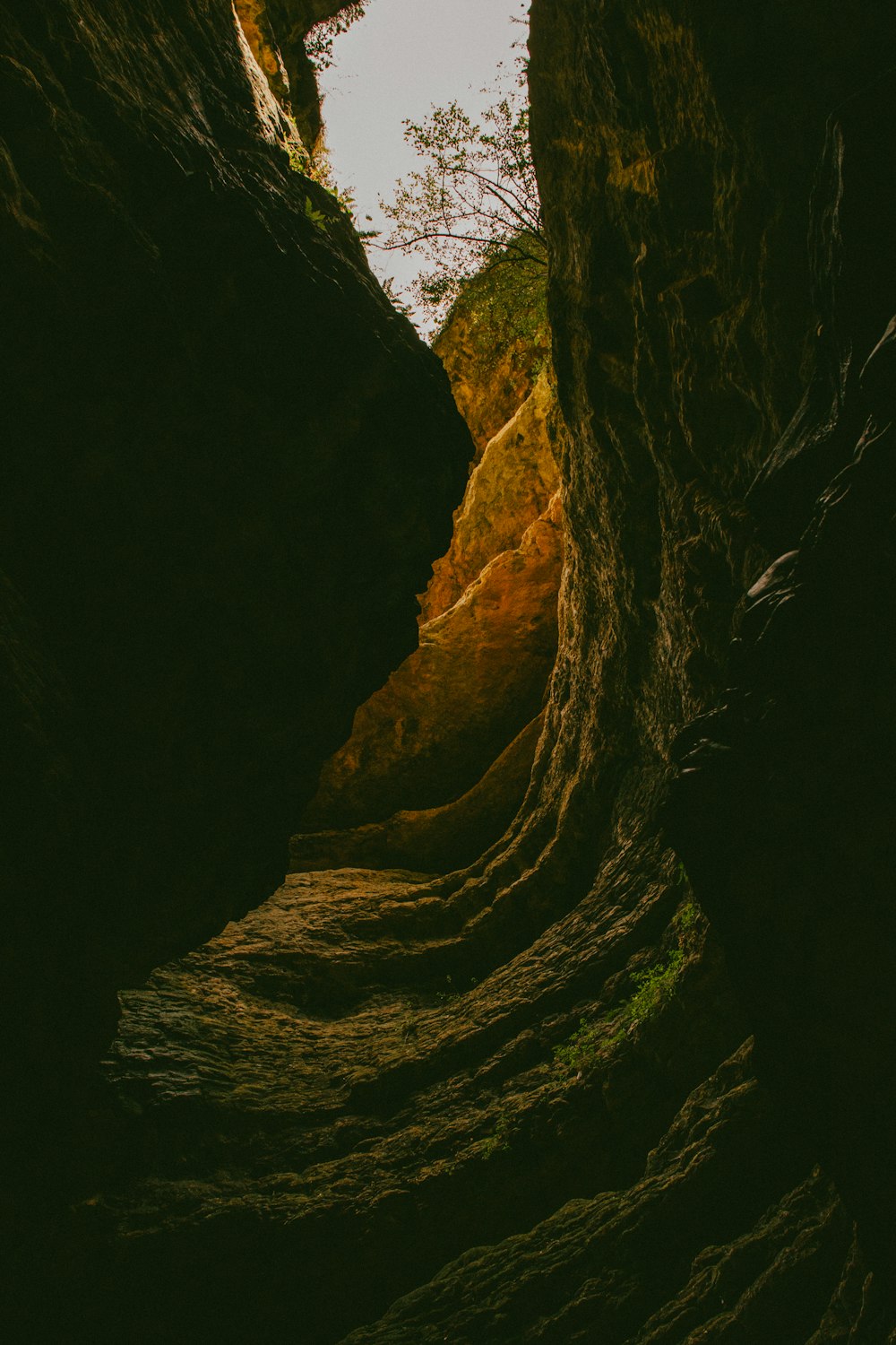 a narrow narrow passage between two large rocks