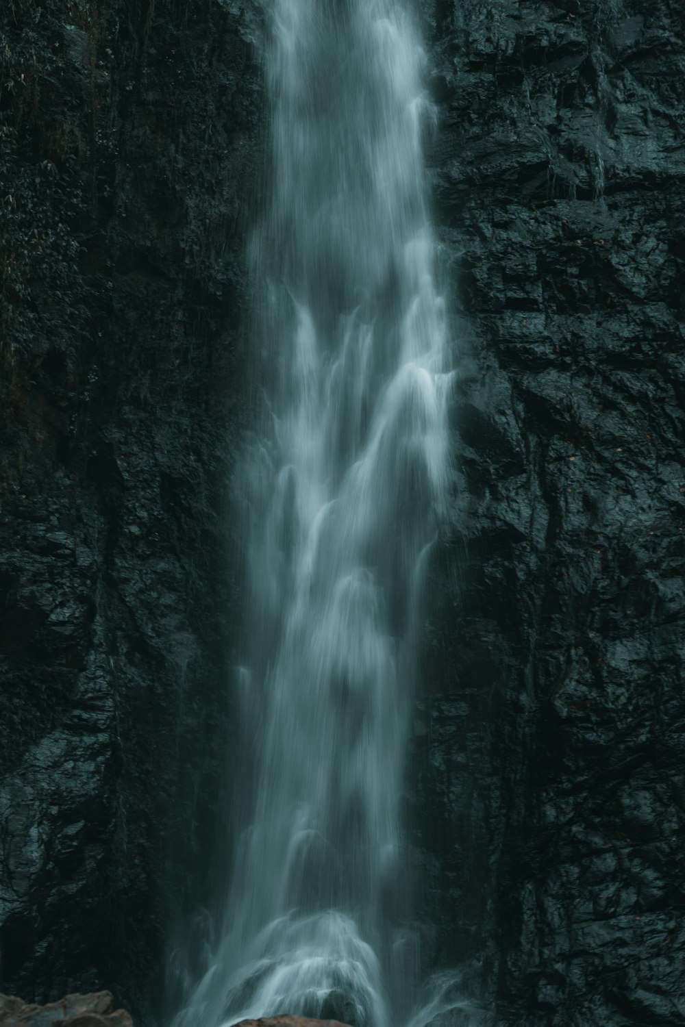 a waterfall with a large amount of water coming out of it