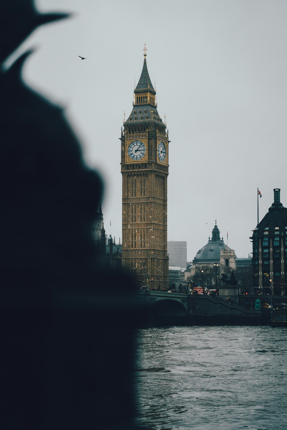 the big ben clock tower towering over the city of london