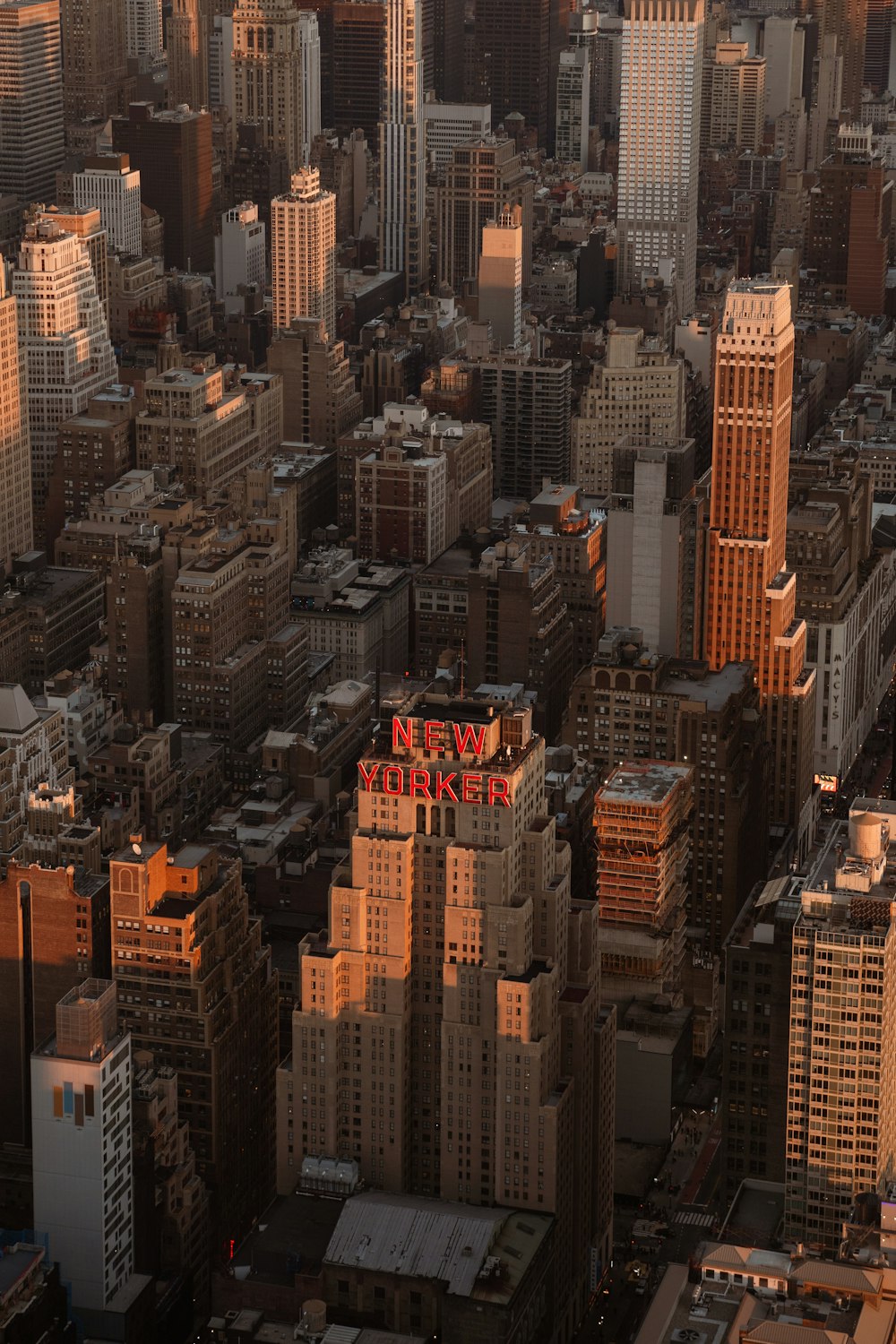 an aerial view of a city with tall buildings