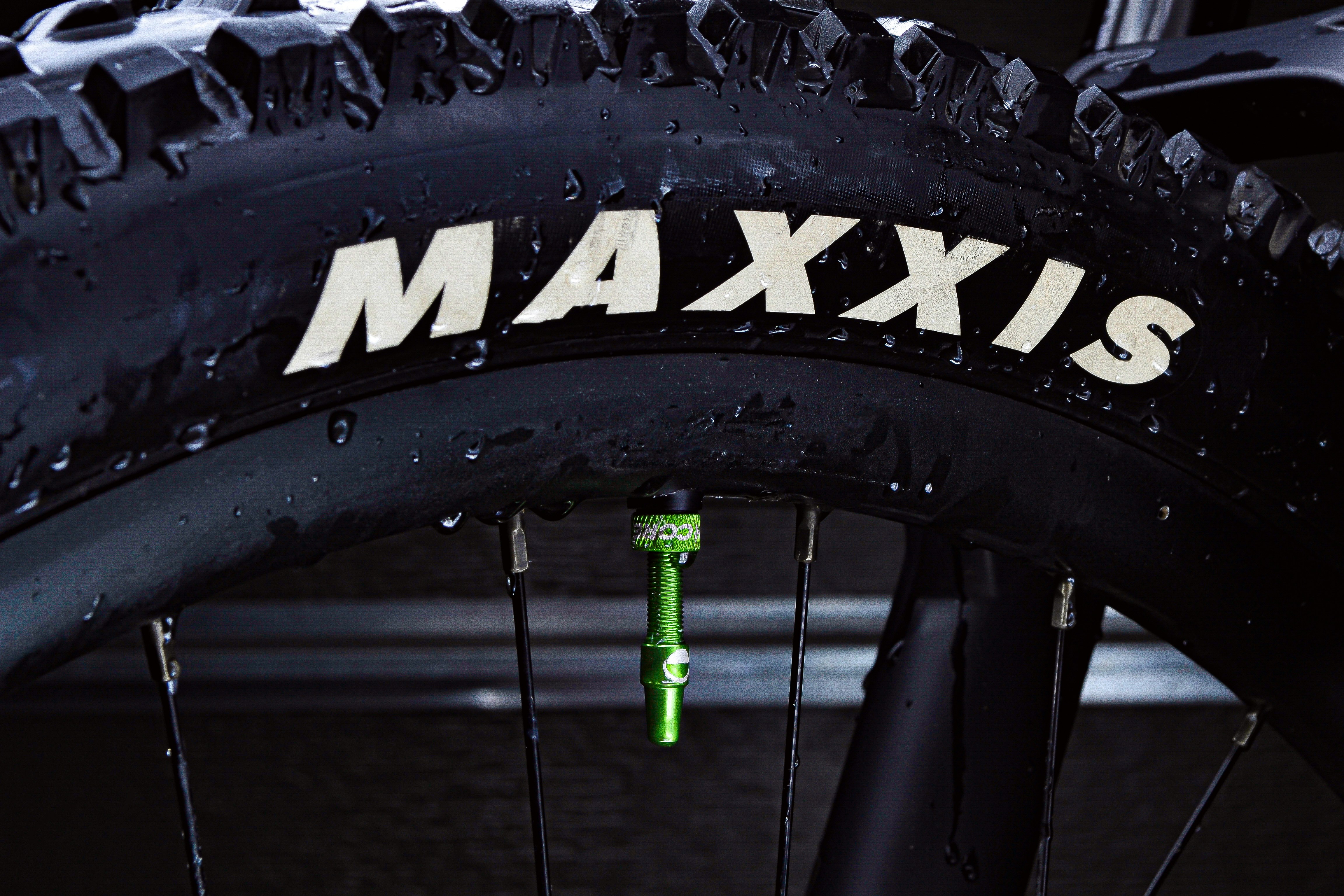 A close up of a tire on a bike photo Free Bike rider Image on Unsplash