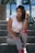 a woman sitting on the steps of a building