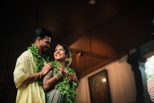 a man and a woman standing next to each other