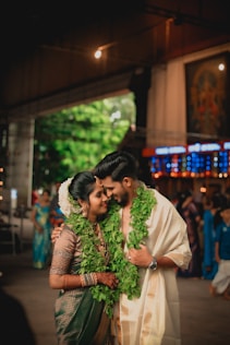 a man and a woman standing next to each other