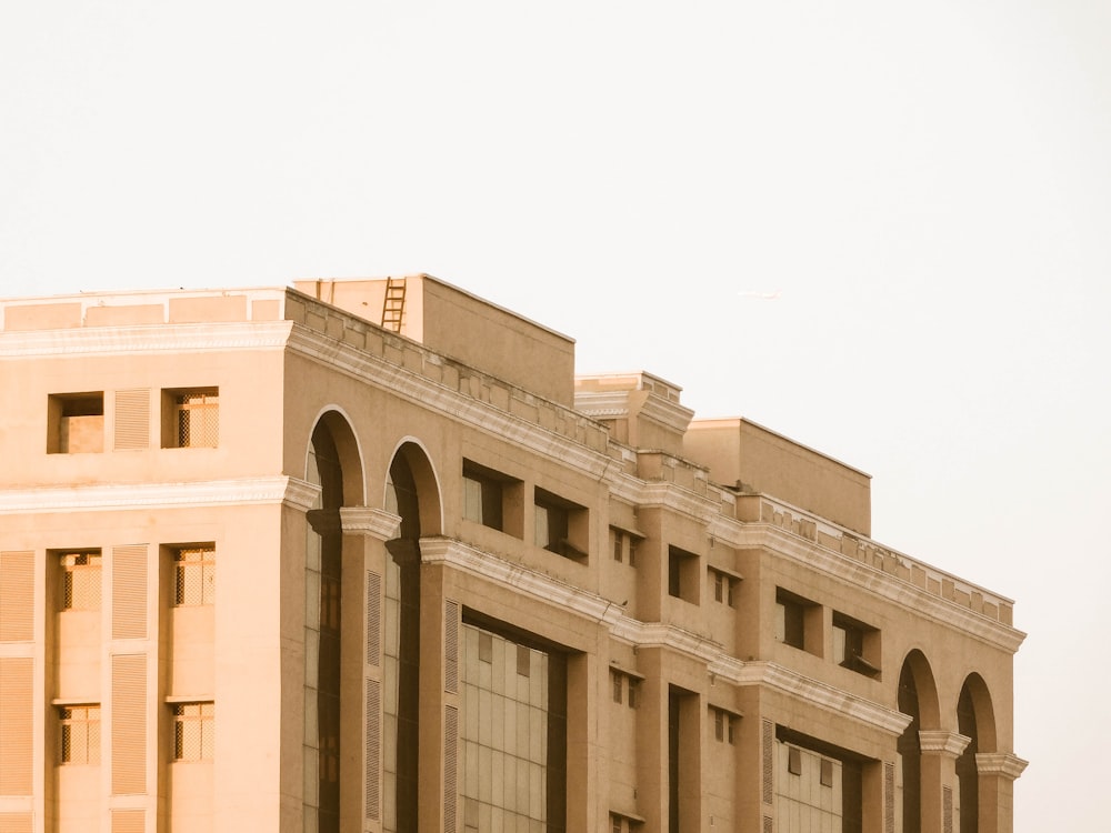 a large building with a clock on the front of it