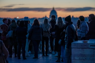 a group of people standing next to each other