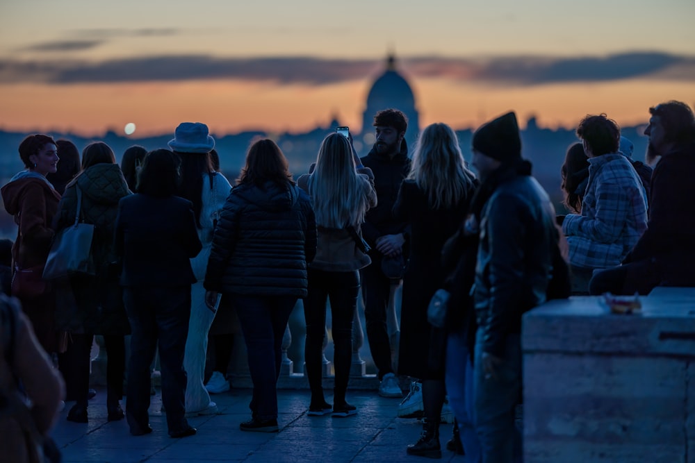 a group of people standing next to each other