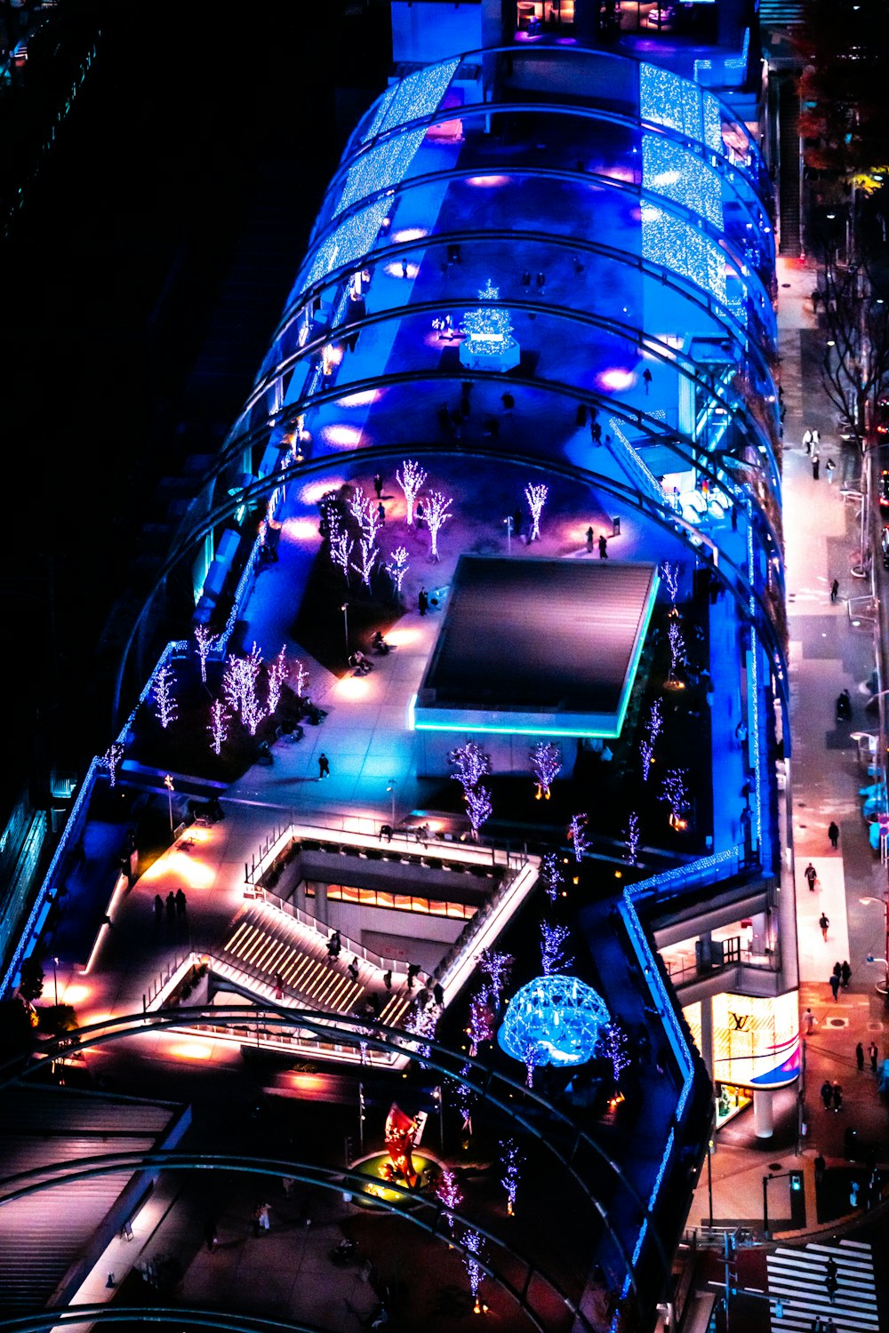 an aerial view of a city at night