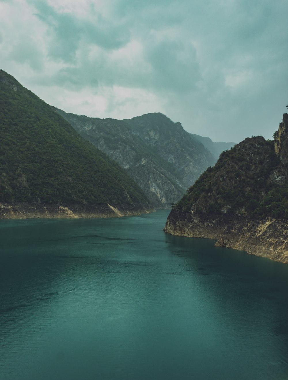 a large body of water surrounded by mountains