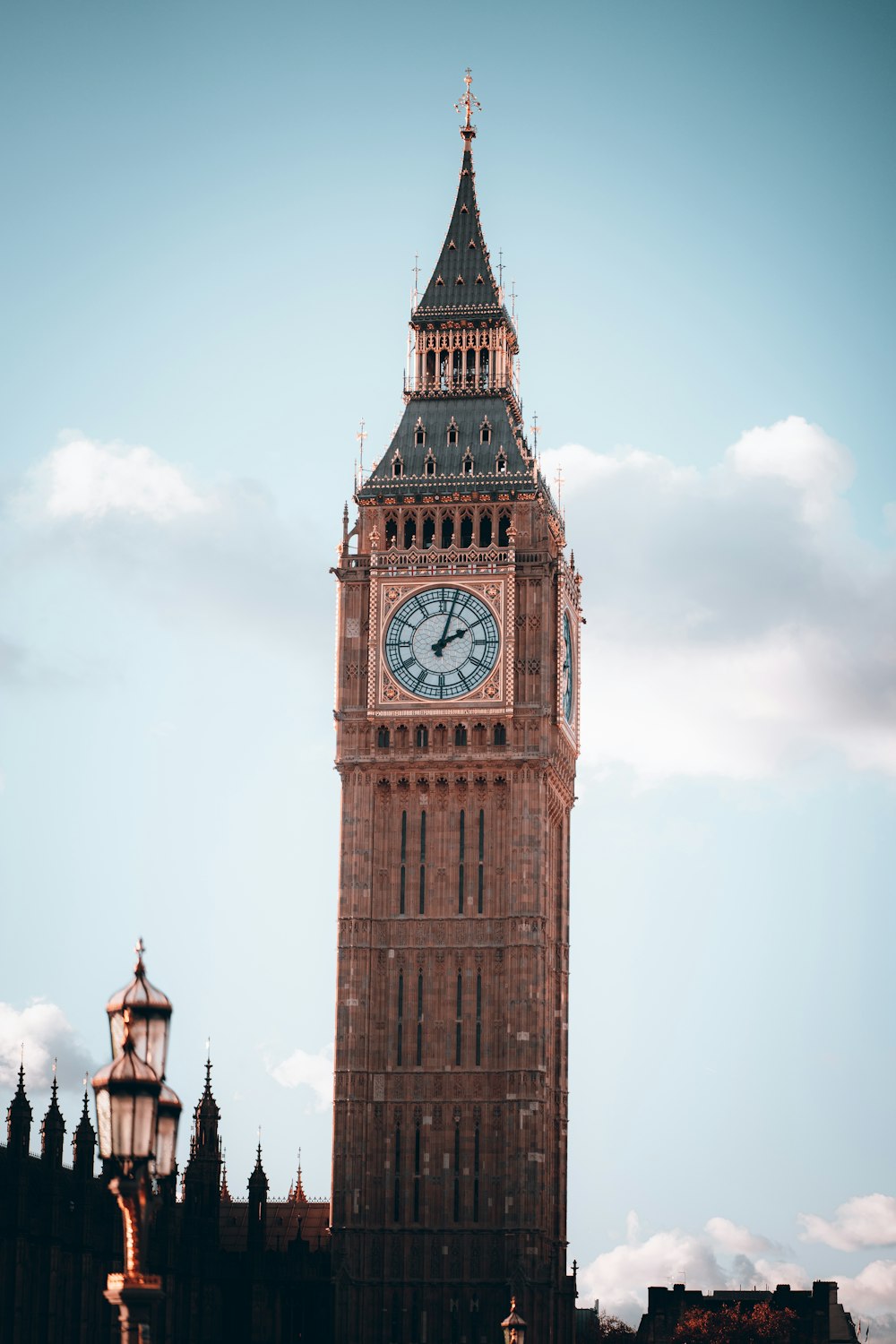 a tall clock tower with a sky background