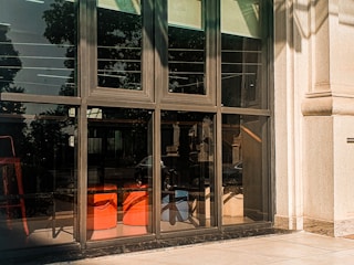 A freshly replaced window shining with clear glass in a modern living room.